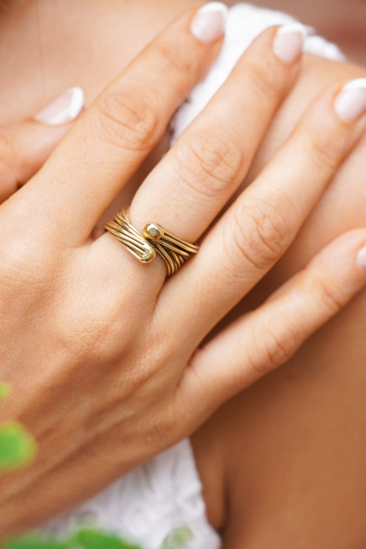 Cluster adjustable brass ring. Size 6-9