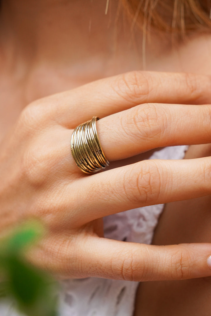 Cluster adjustable brass ring. Size 6-9