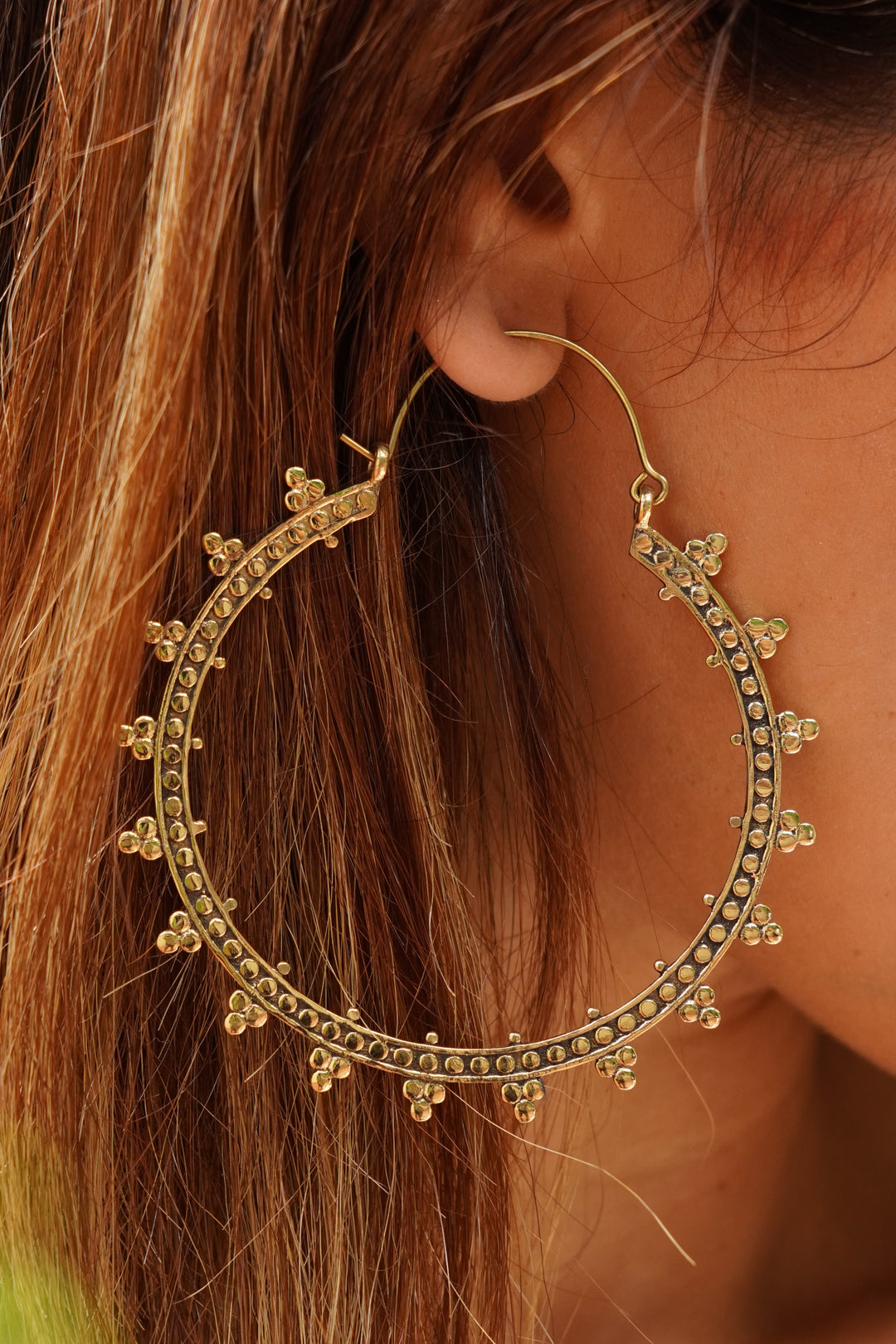 Tribal brass hoops