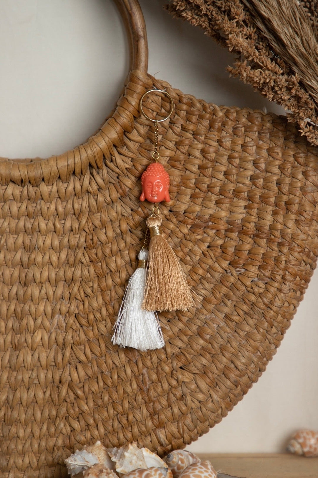 Coral Buddha Tassel Keychain