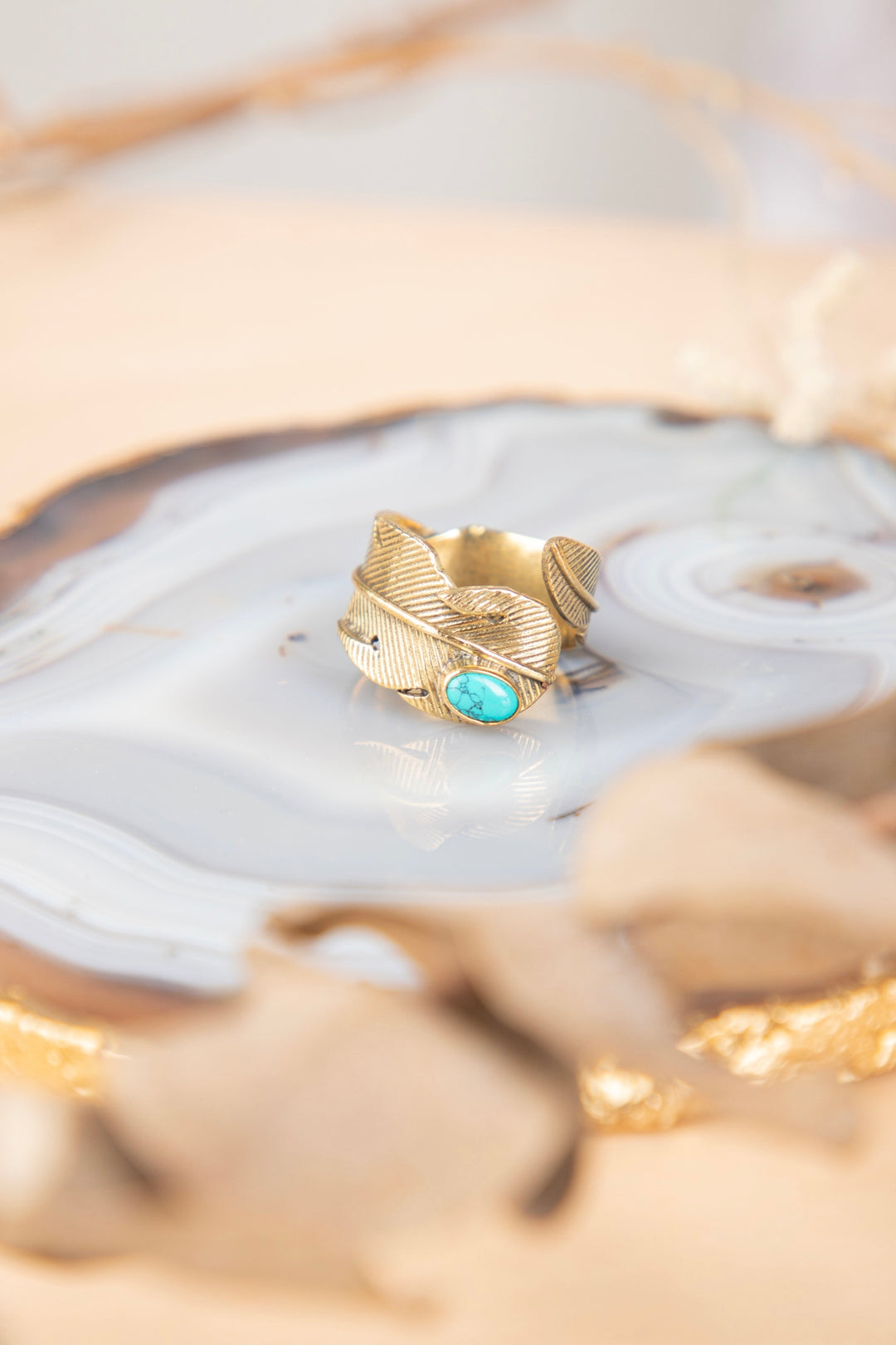 Turquoise feather adjustable brass ring. Size 5-8
