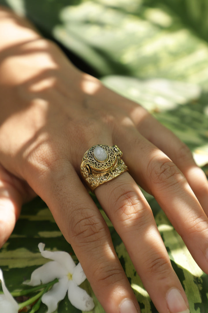Moonstone brass poison ring. Adjustable. Size 5-8