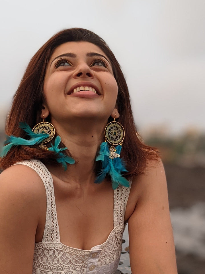 Dreamcatcher teal brass earring