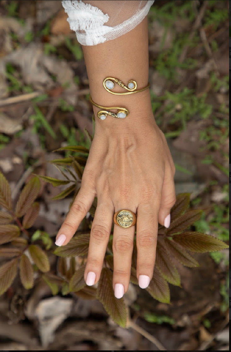 Infinity loop with moonstone. Adjustable brass bangle