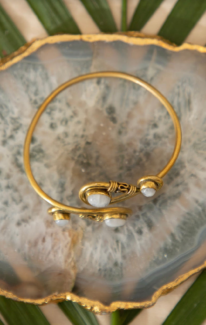 Infinity loop with moonstone. Adjustable brass bangle