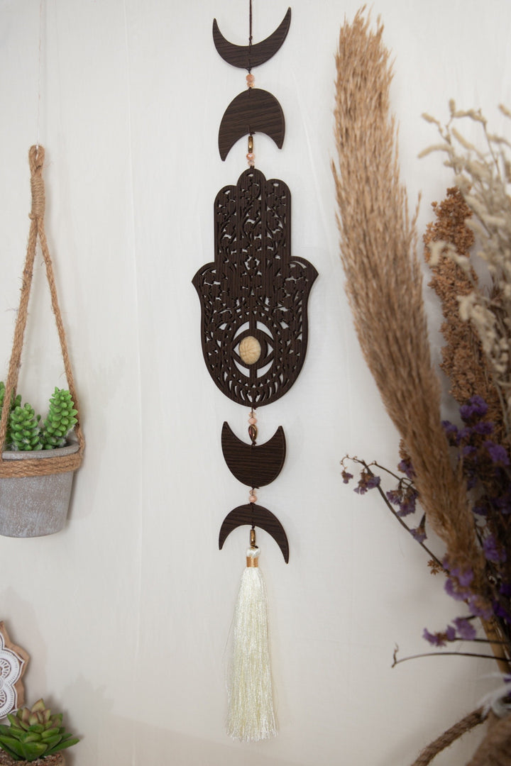 Hamsa wooden tassel hanging.