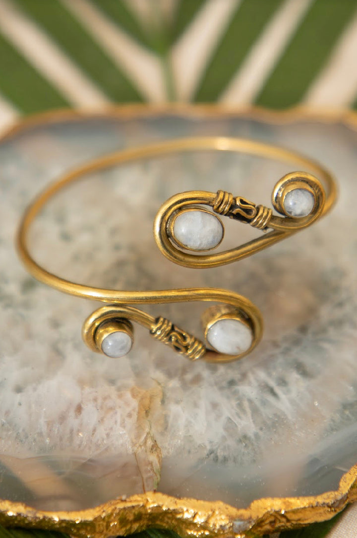 Infinity loop with moonstone. Adjustable brass bangle