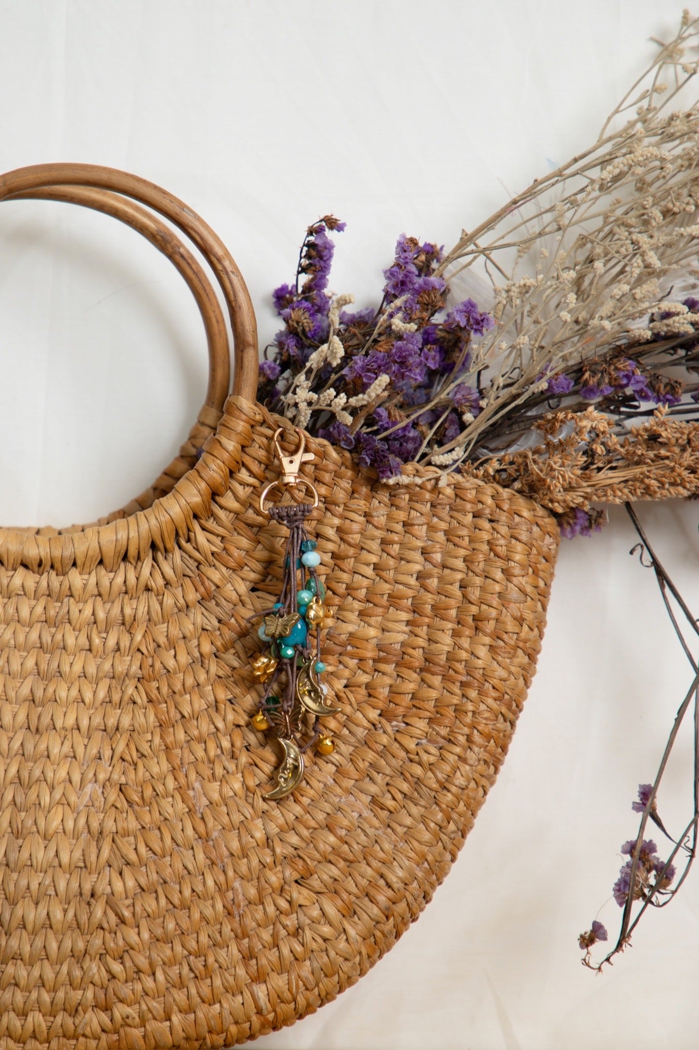 Turquoise tassel charm.