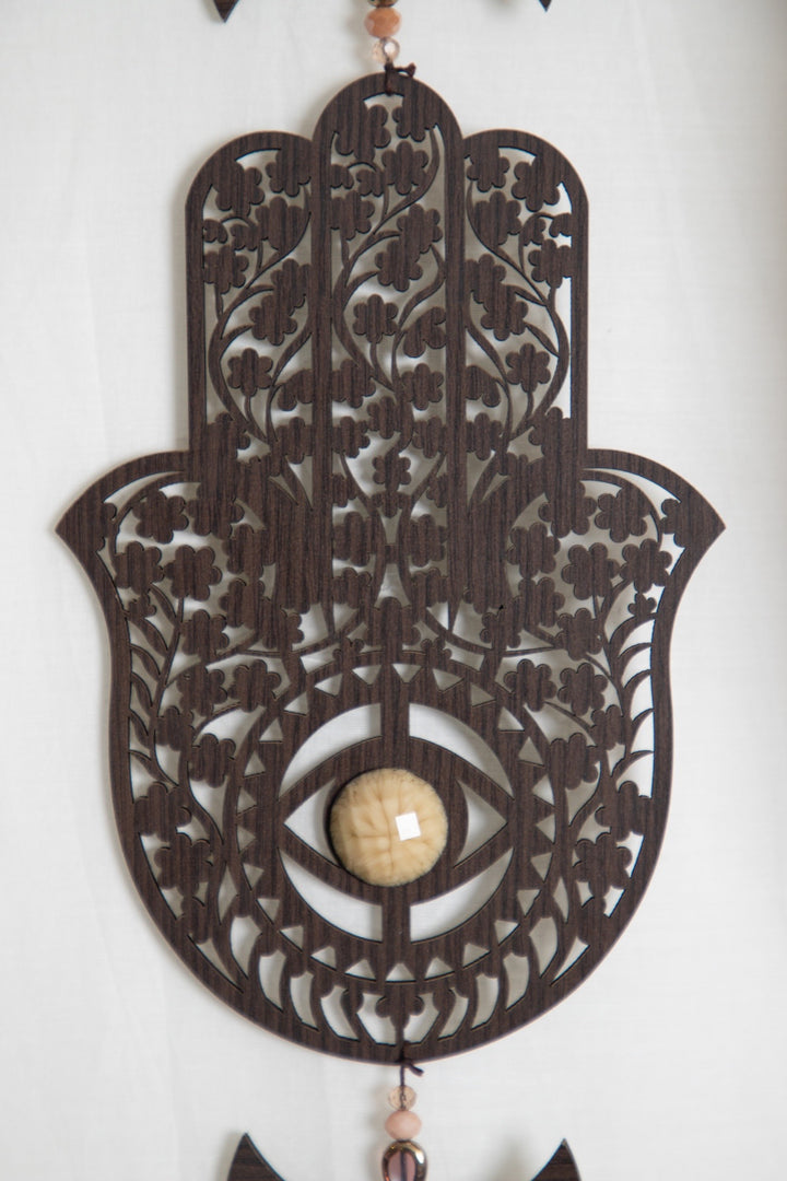 Hamsa wooden tassel hanging.