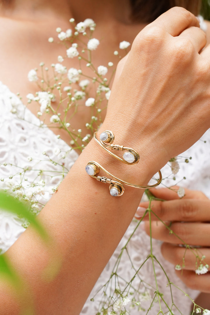 Infinity loop with moonstone. Adjustable brass bangle