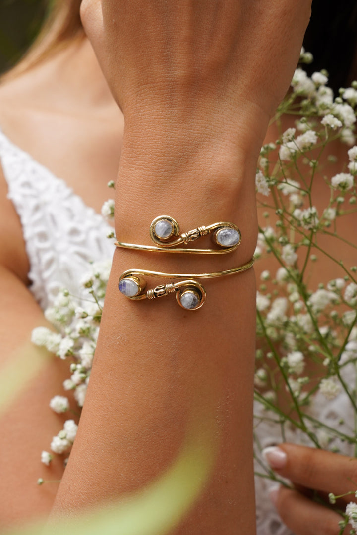 Infinity loop with moonstone. Adjustable brass bangle