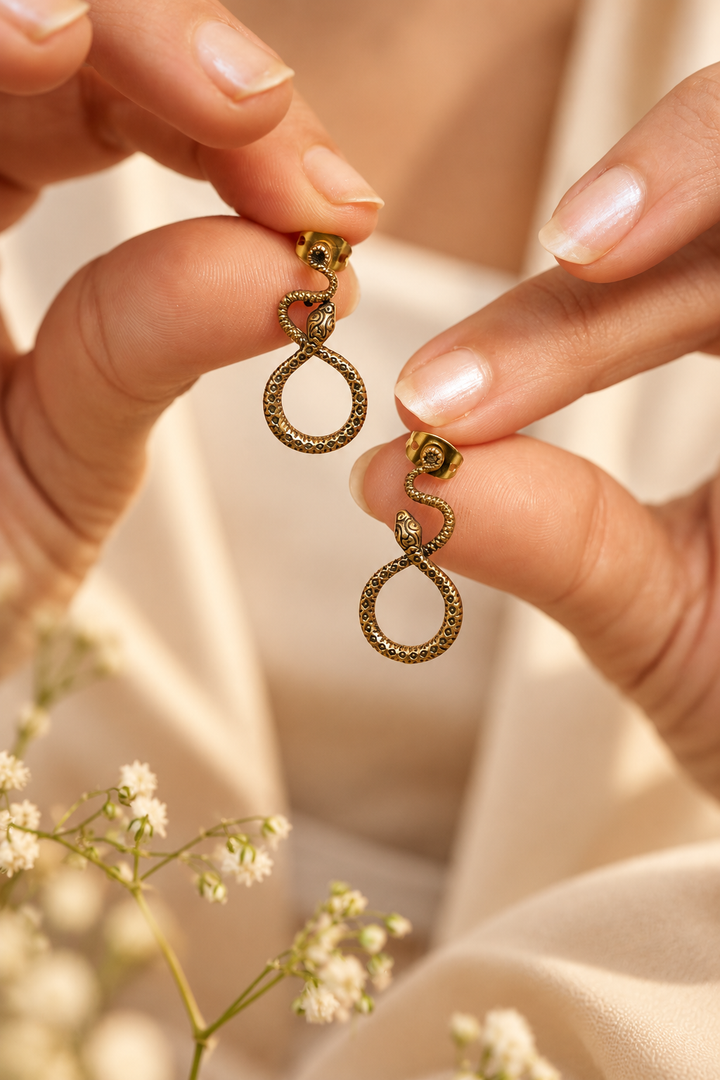 Tribal snake stud brass earrings.