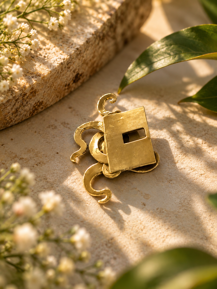 Octopus pocket slider in pure brass