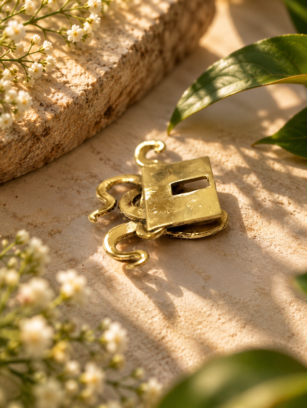 Octopus pocket slider in pure brass