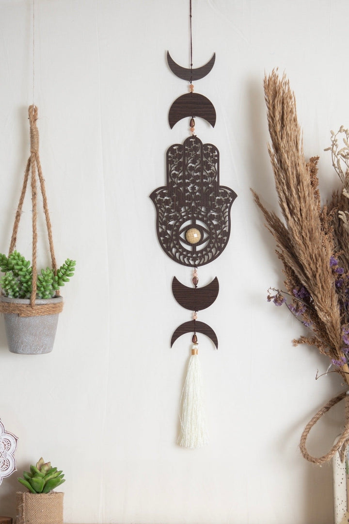 Hamsa wooden tassel hanging.