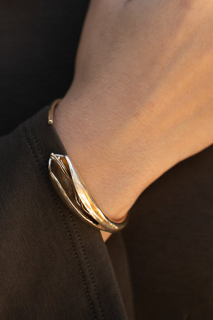 Floating pod brass bangle gold plated
