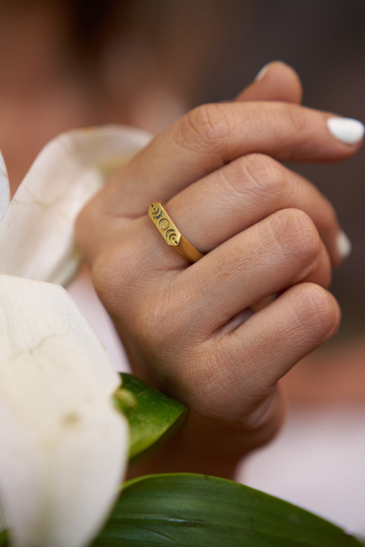 Moon phase engraved ring