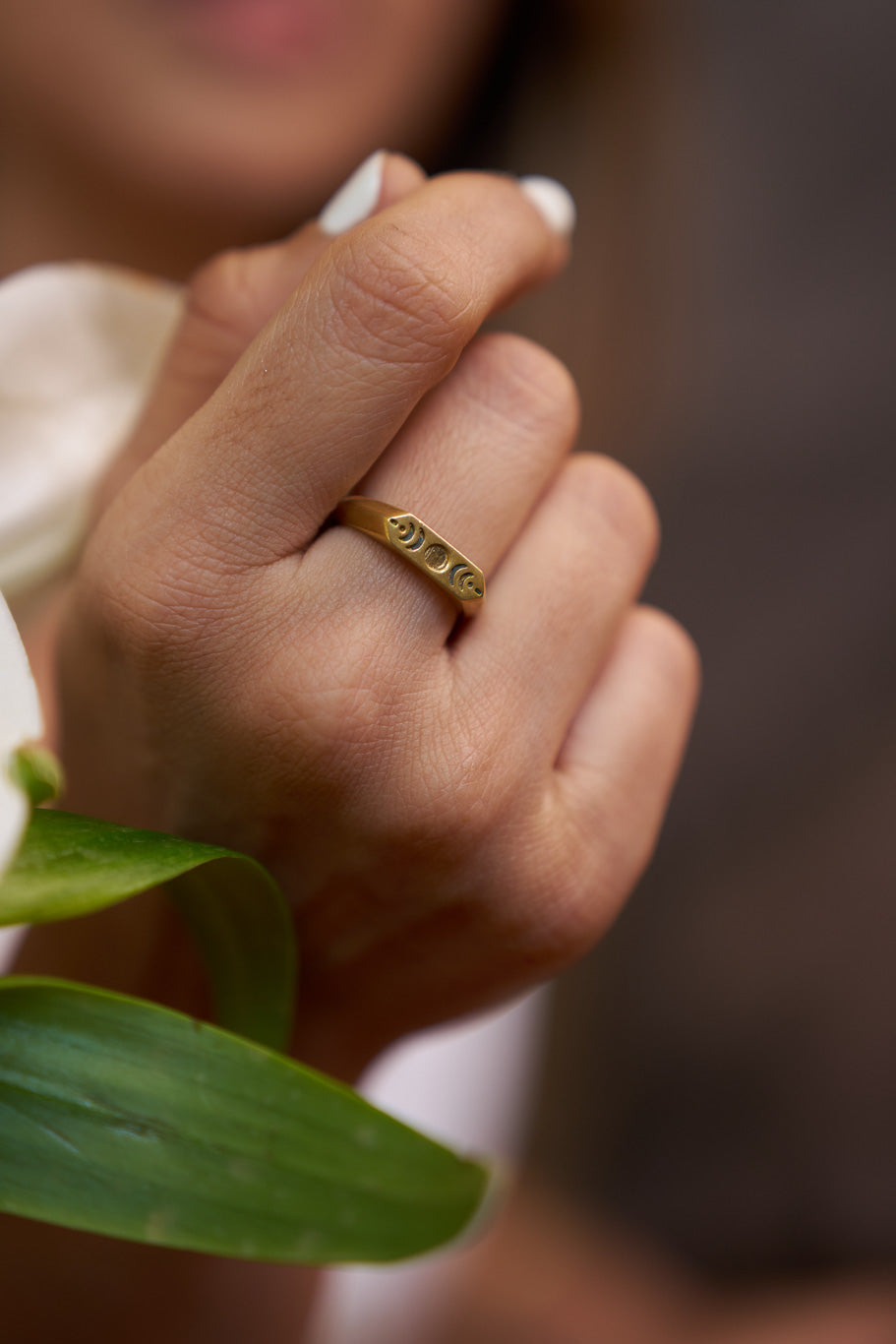 Moon phase engraved ring