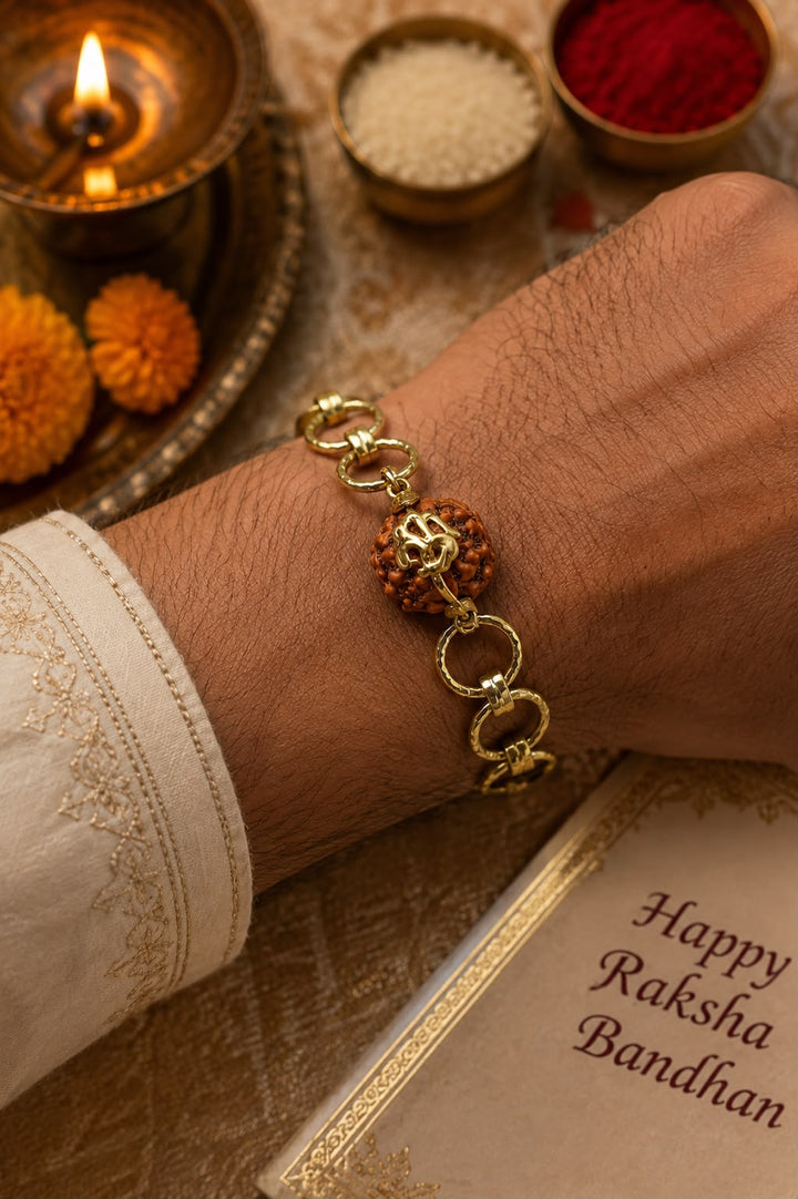 Rudra Om Rakhi With Rice, Haldi & Kum Kum Dibbi Gift Pack
