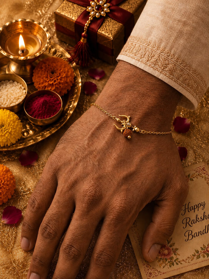 Trishul OM bracelet with rice, haldi & kum kum dibbi gift pack