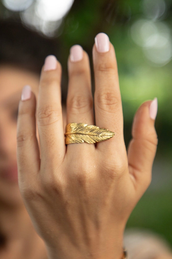 Feather wrap adjustable ring. Size 5-7