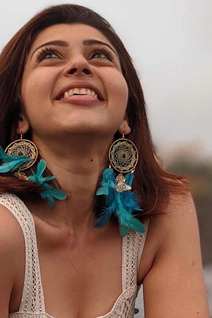 Dreamcatcher teal earring