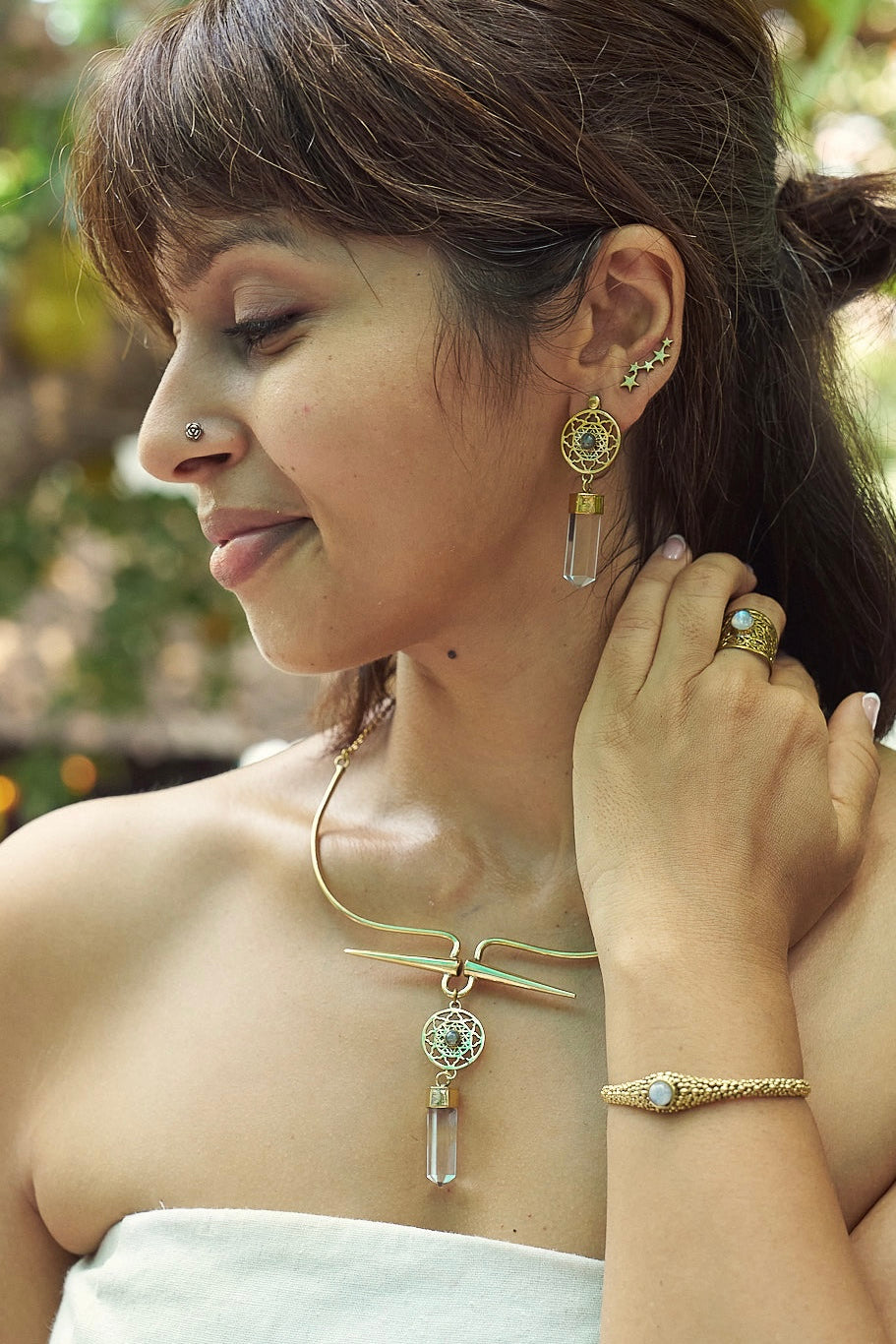 Clear quartz mandala with detachable stud earrings.