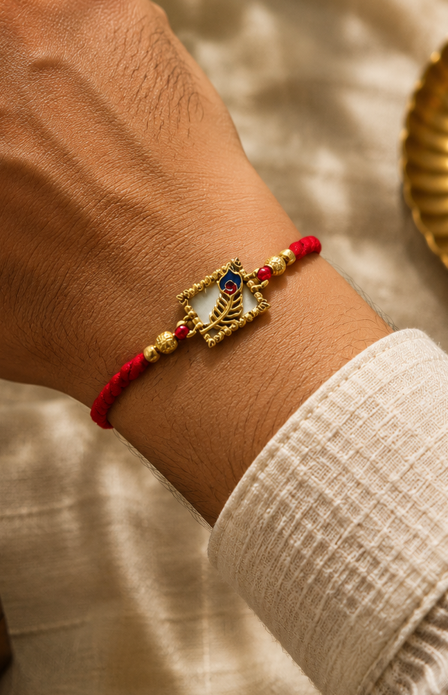 Mor pankh rakhi- mix alloy with rice, haldi & kum kum dibbi gift pack