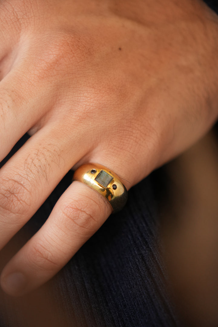 Classic gemstone band. Non-adjustable. Size 7