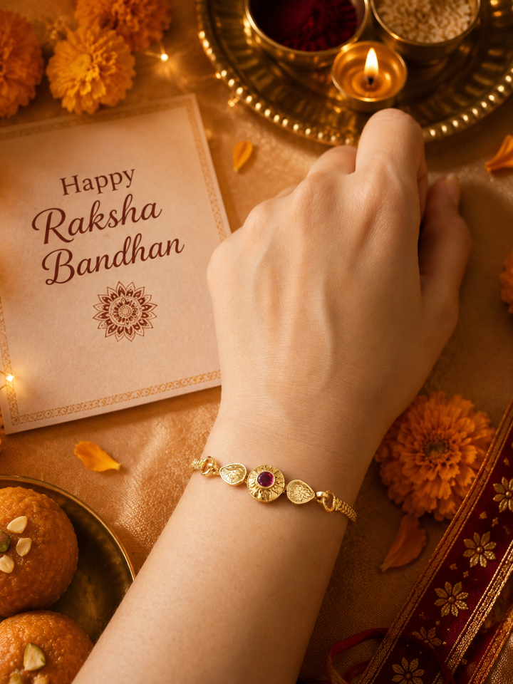 Red Lumba Rakhi with rice, haldi & kum kum dibbi gift pack