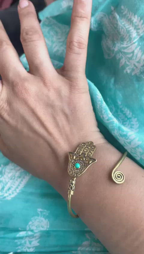 Hamsa hand cuff with turquoise stone