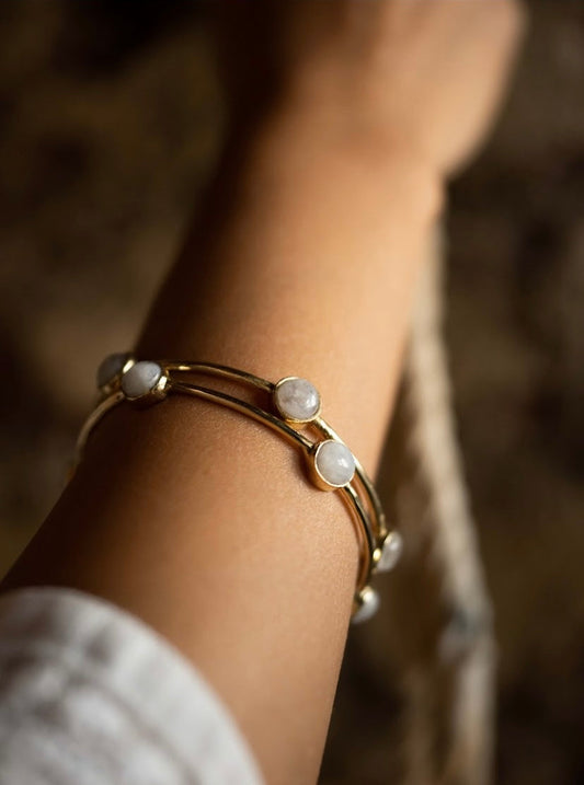 Moonstone drop bangle + lapis petal ring combo