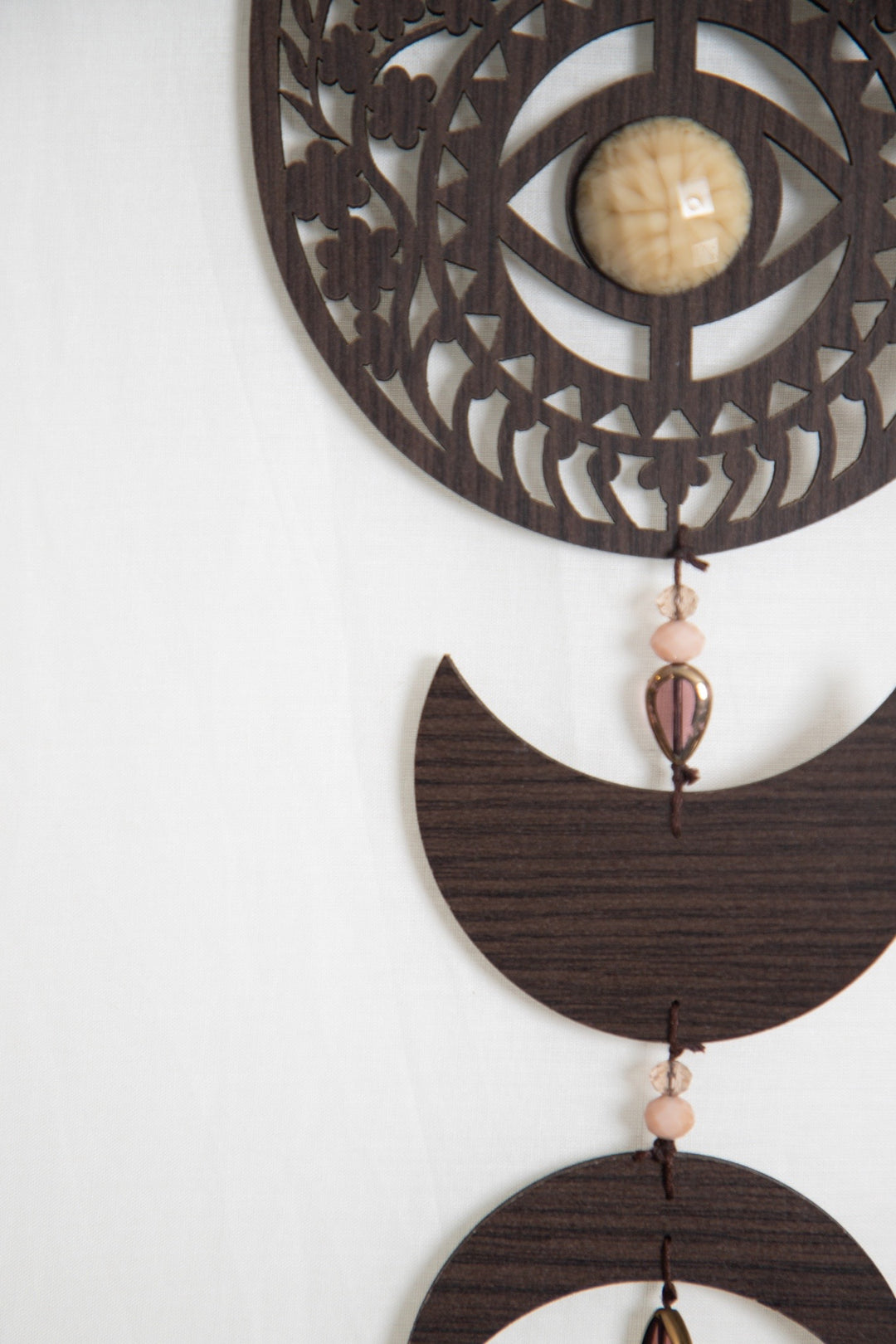 Hamsa wooden tassel hanging.