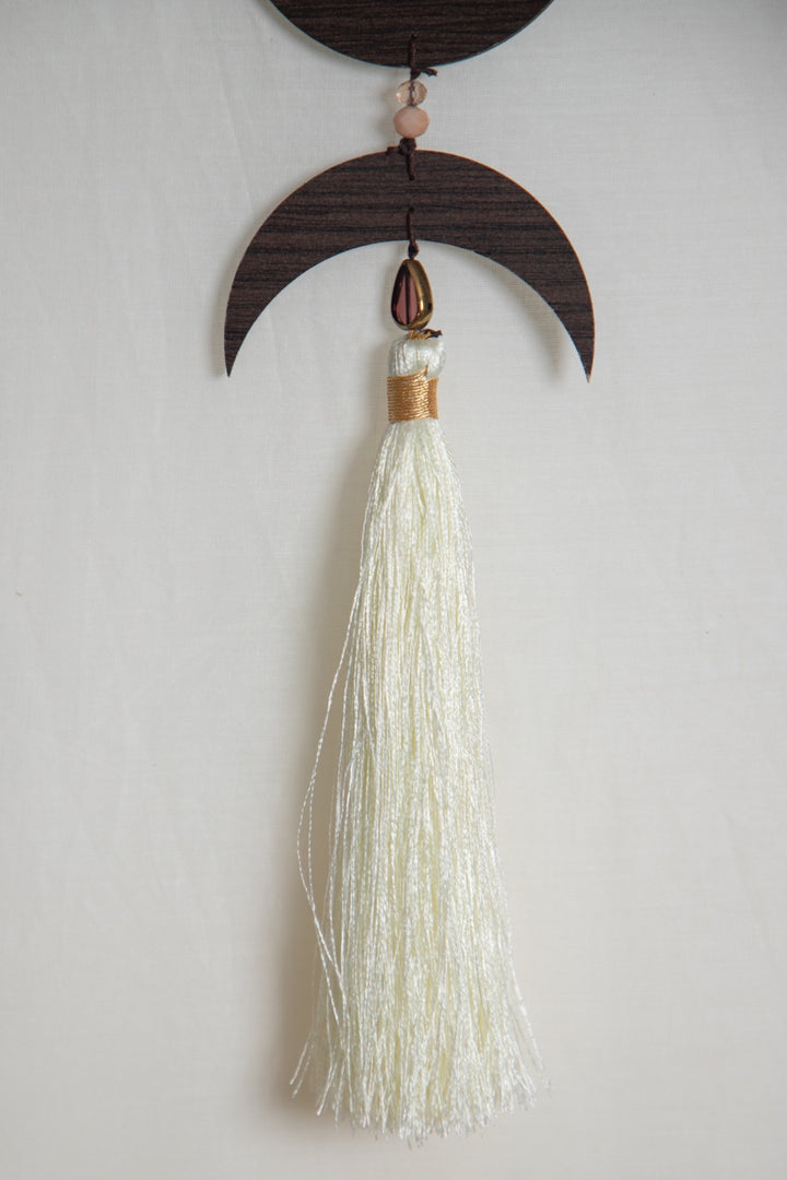 Hamsa wooden tassel hanging.